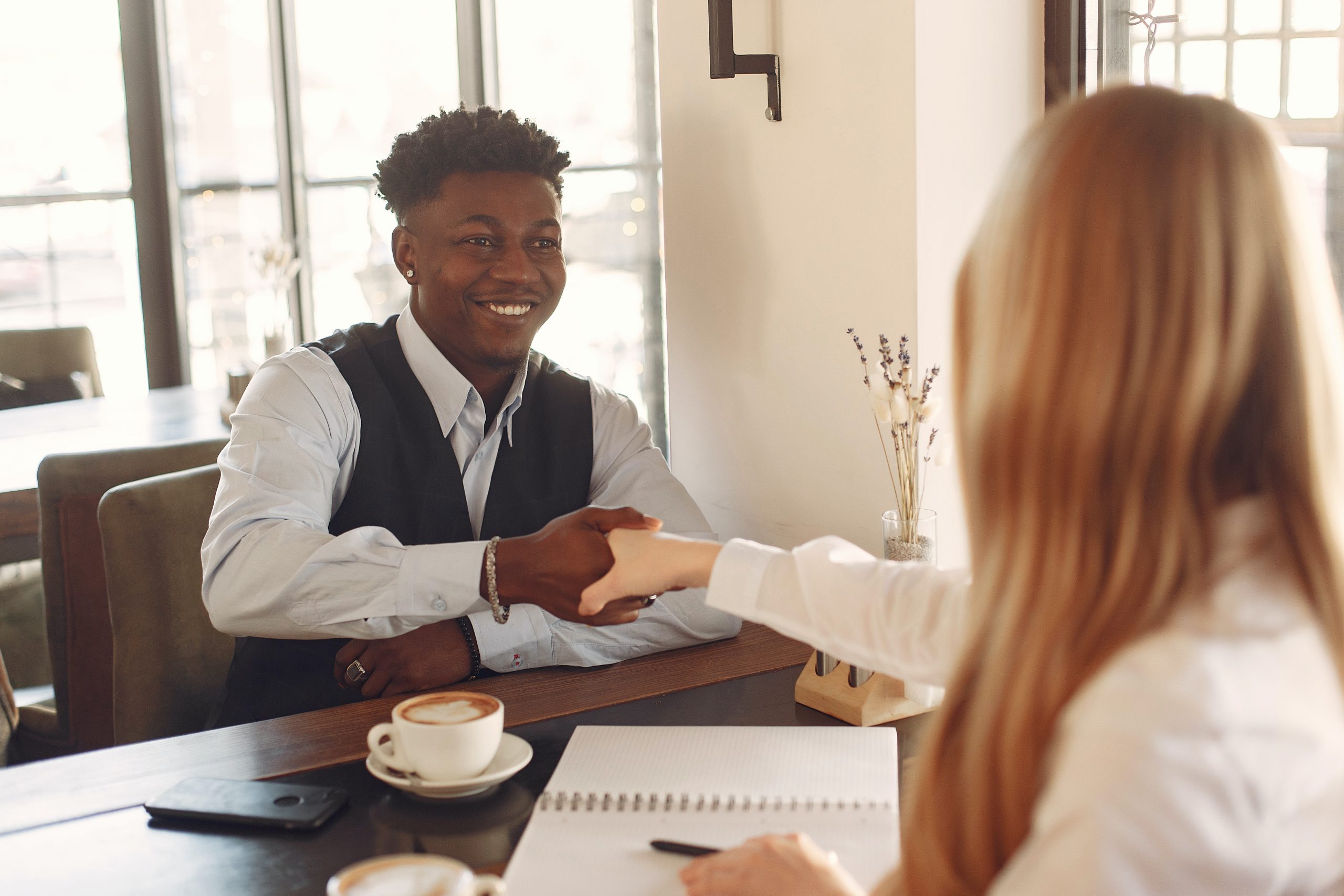 man-iand-woman-doing-a-handshake-3874034 Understanding the candidate recruitment process