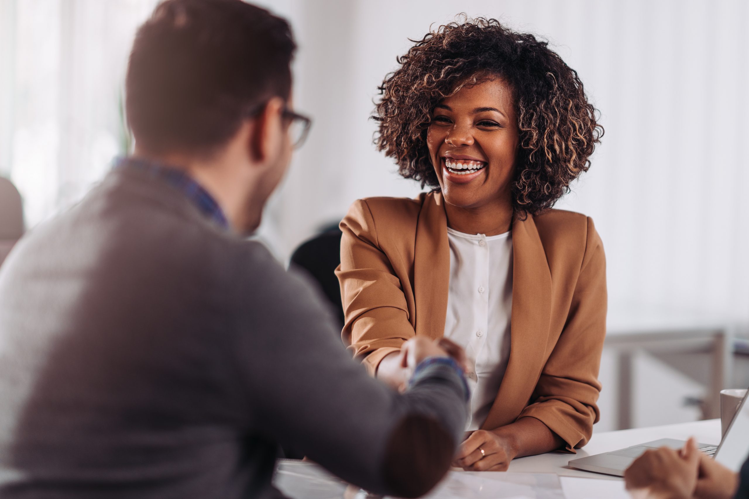 Business people shaking hands after meeting Are you considering a career in recruitment?
