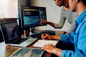 Programmer working in a software development and coding technolo The software developer skills companies need the most