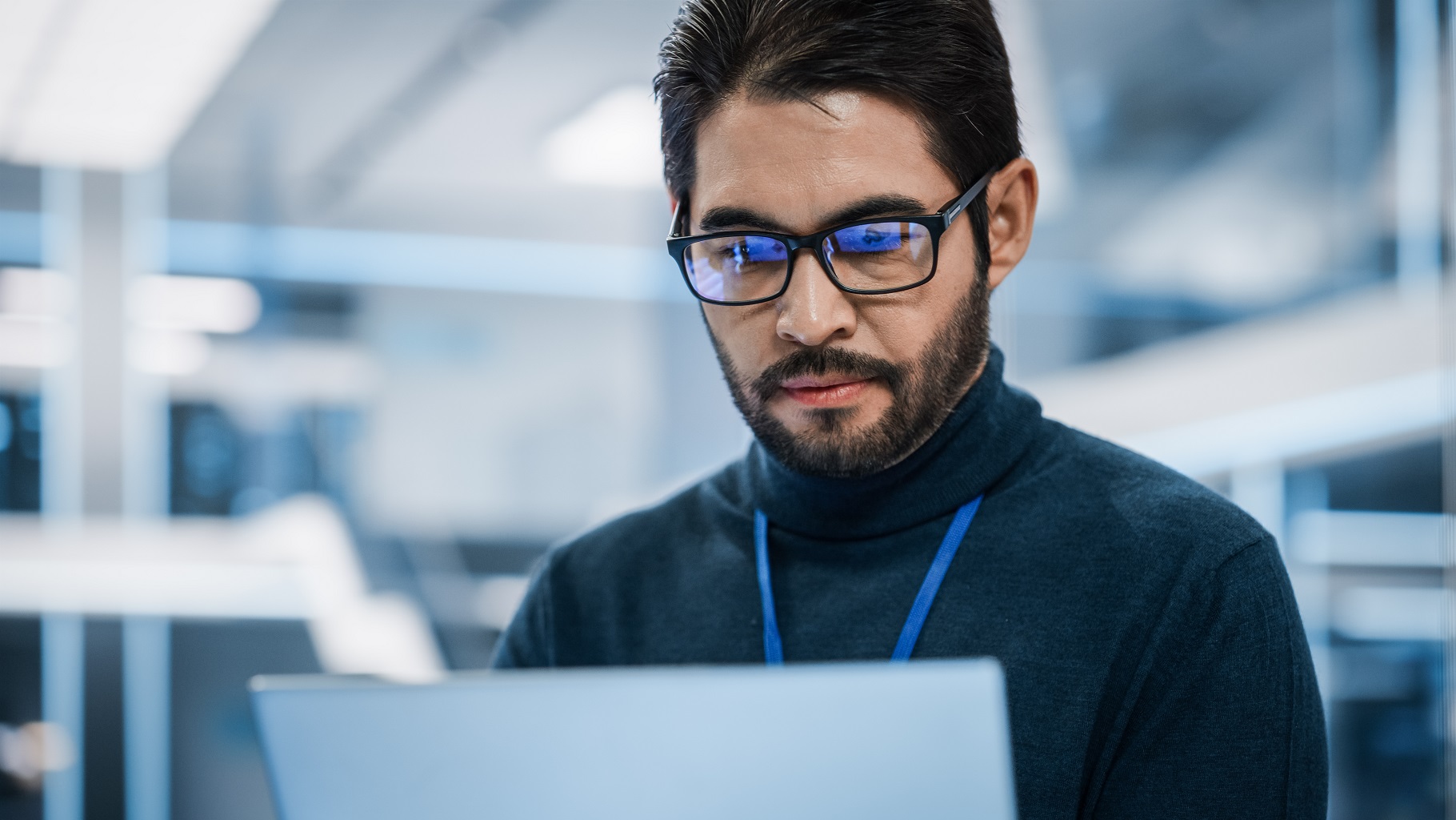 Close Up Portrait of a Talented Latin Man Looking at Camera and How can a recruiter help you beat the IT talent shortage?